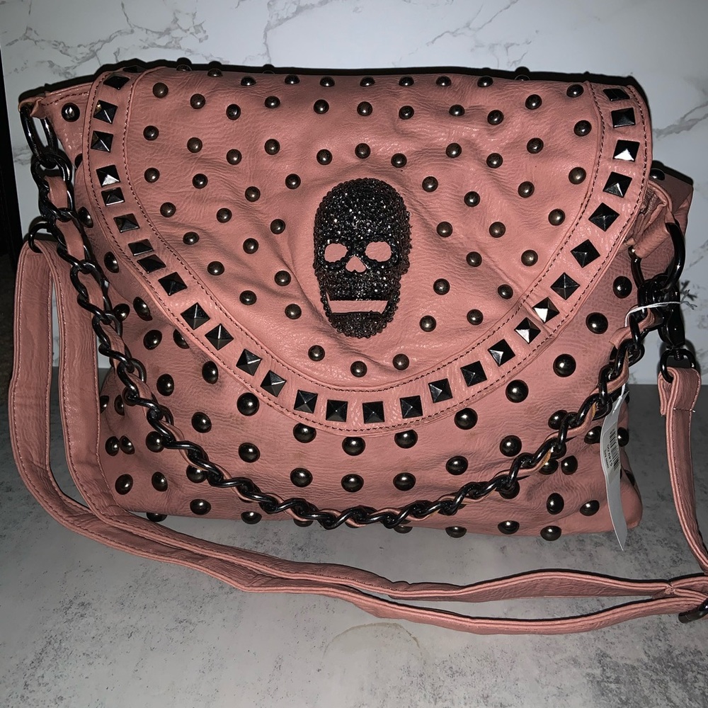 Pink studded handbag with crystal skull
